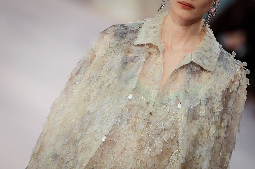 A model wears an outfit covered with featherlike detail at the Chanel haute couture spring/summer 2026 show in Paris, on January 27. Photo: AFP