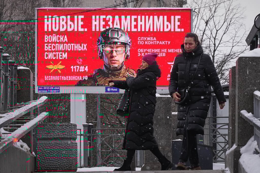 A billboard in St Petersburg advertising contract Russian military service. It reads: ‘New. Irreplaceable. Unmanned Systems Troops’. Photo: EPA