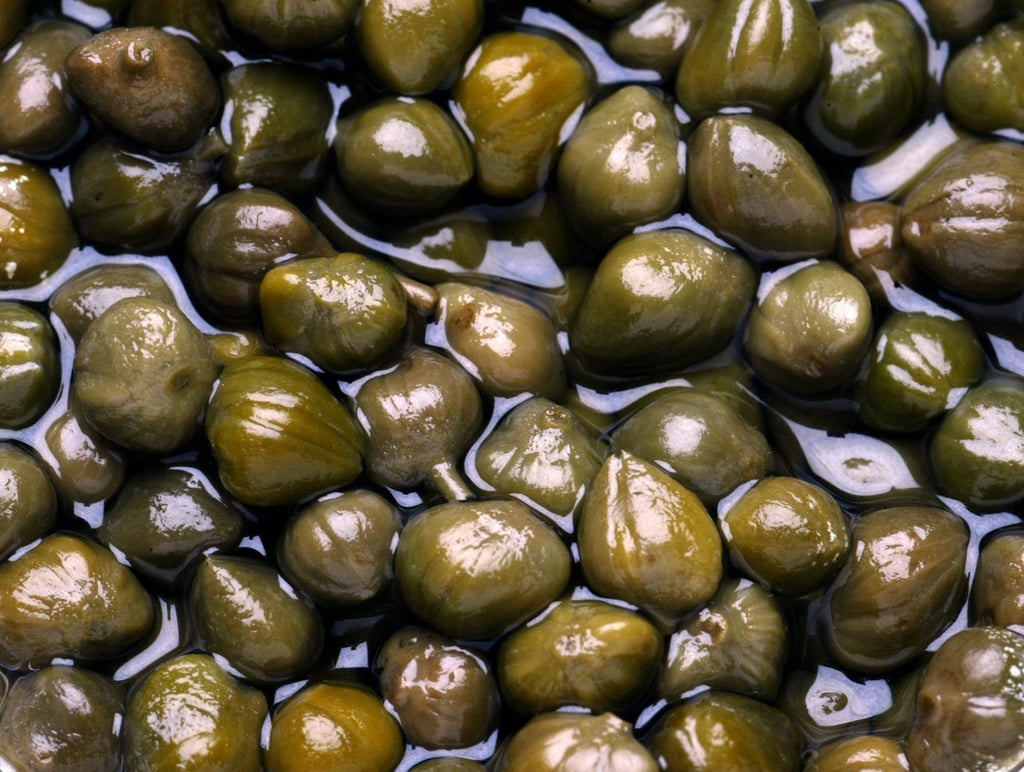 The most common way to preserve capers is by pickling them. Photo: Antony Dickson