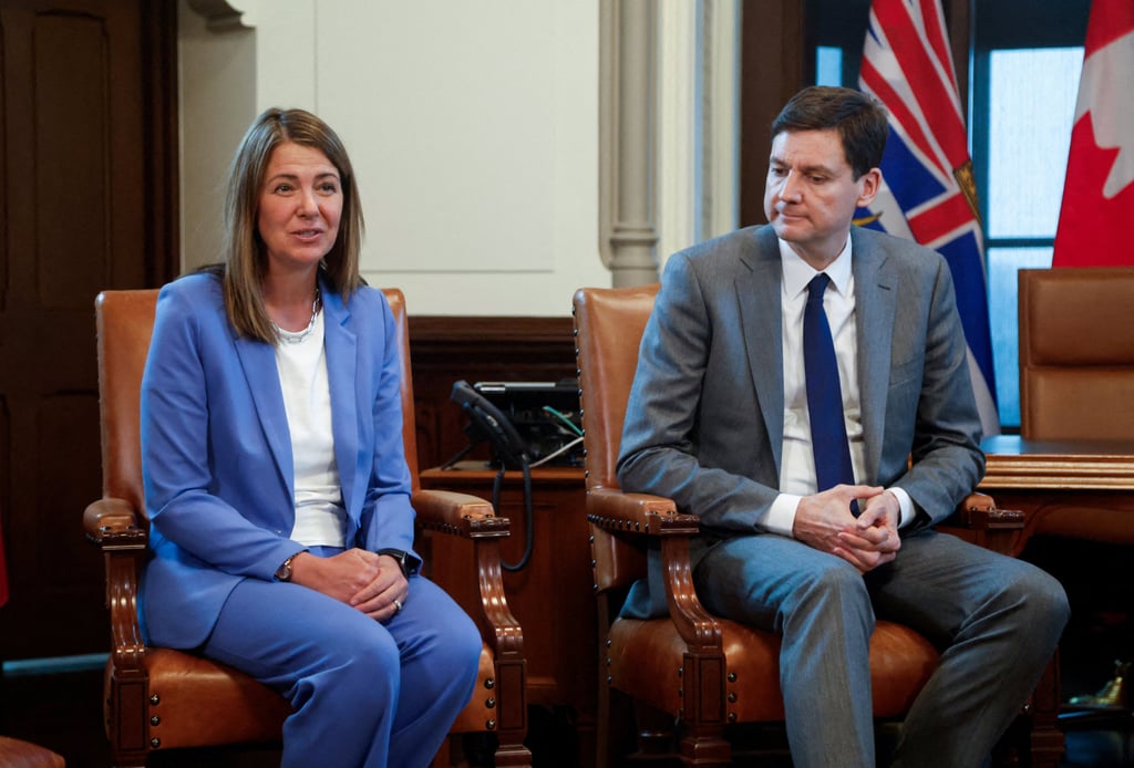 British Columbia Premier David Eby and Alberta Premier Danielle Smith attend a meeting in Ottawa, Ontario, Canada, on Wednesday. Photo: Reuters British Columbia Premier David Eby and Alberta Premier Danielle Smith attend a meeting in Ottawa, Ontario, Canada, on Wednesday. Photo: Reuters