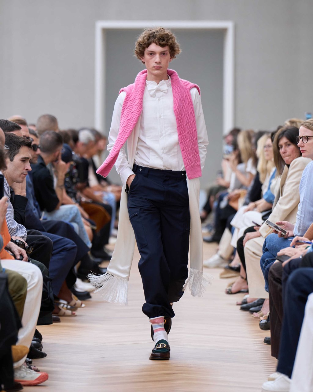 Draped sweaters are in – this pink cable knit stole the show at Jonathan Anderson’s Dior men’s summer 2026 show. Photo: Handout