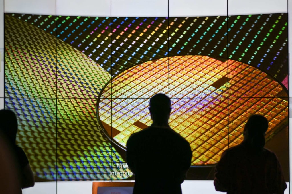 Visitors watch a wafer shown on screens at the TSMC Renovation Museum in Hsinchu. TSMC must increase output this year as Nvidia “needs a lot of wafers”, according to Jensen Huang. Photo: AFP Visitors watch a wafer shown on screens at the TSMC Renovation Museum in Hsinchu. TSMC must increase output this year as Nvidia “needs a lot of wafers”, according to Jensen Huang. Photo: AFP
