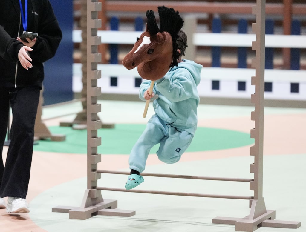 A young visitor has fun in the LeMieux Kids Zone at the Longines Hong Kong International Horse Show. Photo: Eugene Lee