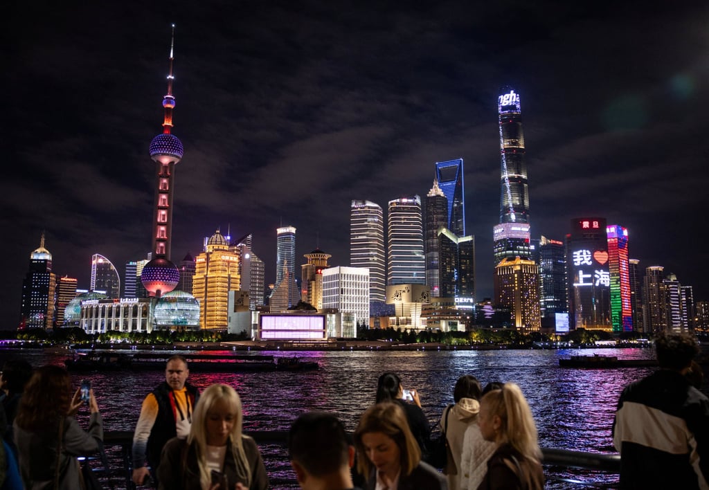 People walk at the Bund in Shanghai, China. Photo: Reuters