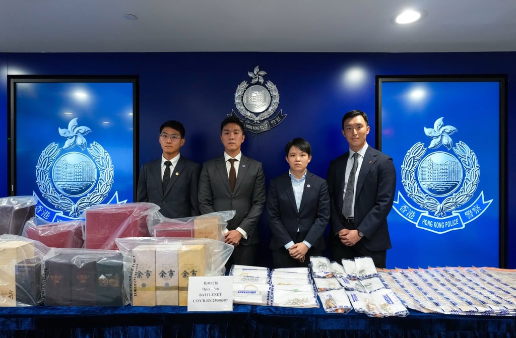 Police display items seized in a series of operations targeting deception and money laundering. Photo: Jelly Tse Police display items seized in a series of operations targeting deception and money laundering. Photo: Jelly Tse