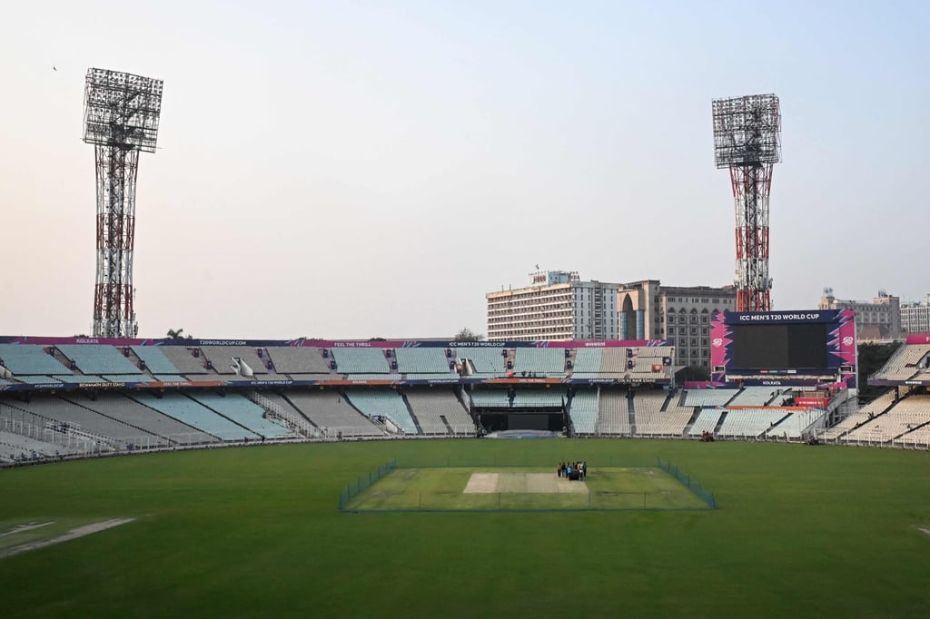 Groundsmen prepare the field at Eden Gardens stadium in Kolkata for the T20 World Cup. Photo: AFP