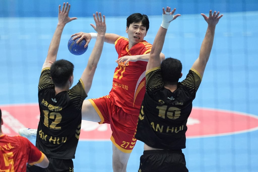 Jiangsu’s Ma Ke takes a shot at goal during his side’s National Games men’s handball final against Anhui at Kai Tak Arena. Photo: Eugene Lee