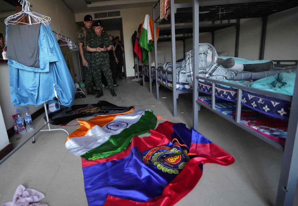 Thai soldiers inspect an abandoned bedroom at the scam centre in O’Smach, Cambodia, on Monday. Photo: AP