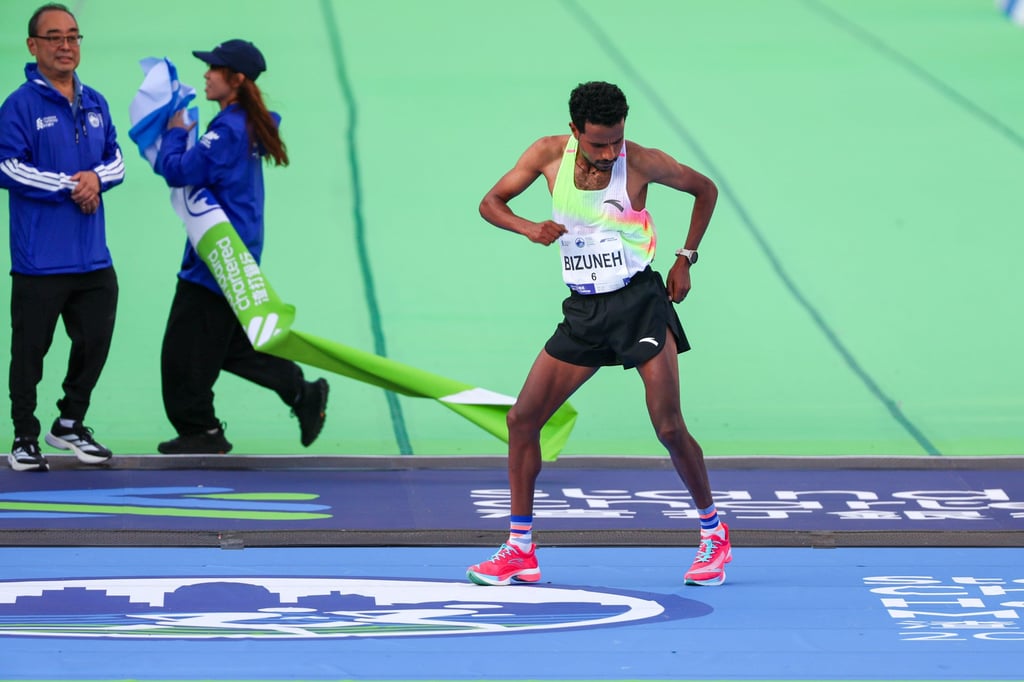 Melaku Belachew breaks into a dance after winning the Standard Chartered Hong Kong Marathon. Photo: Dickson Lee