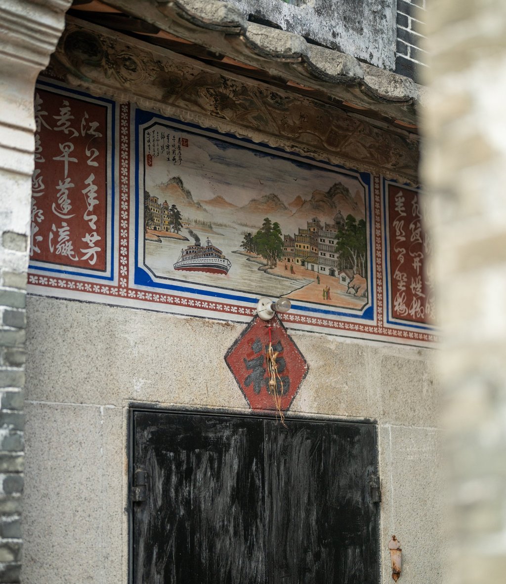 A steamship mural above a door in Majianglong. Photo: Graeme Kennedy A steamship mural above a door in Majianglong. Photo: Graeme Kennedy