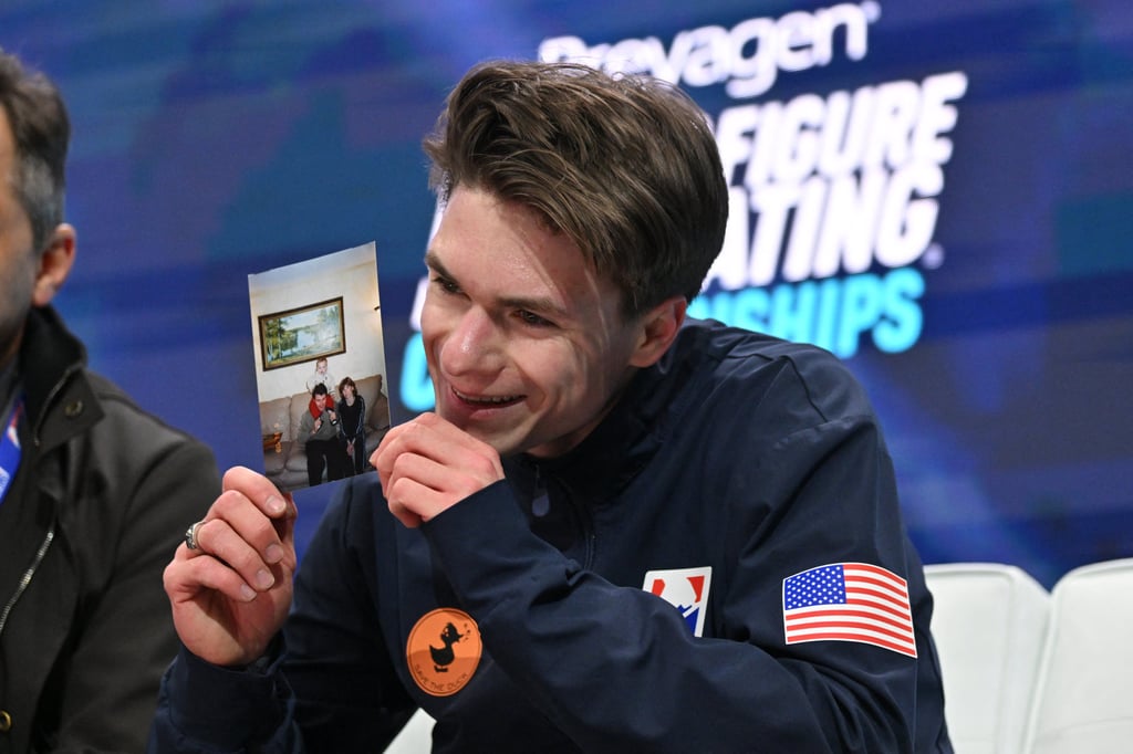 Maxim Naumov pays tribute to his parents after competing in the men’s free skate during the 2026 US Figure Skating Championships. Photo: Jeff Curry-Imagn Images/Reuters