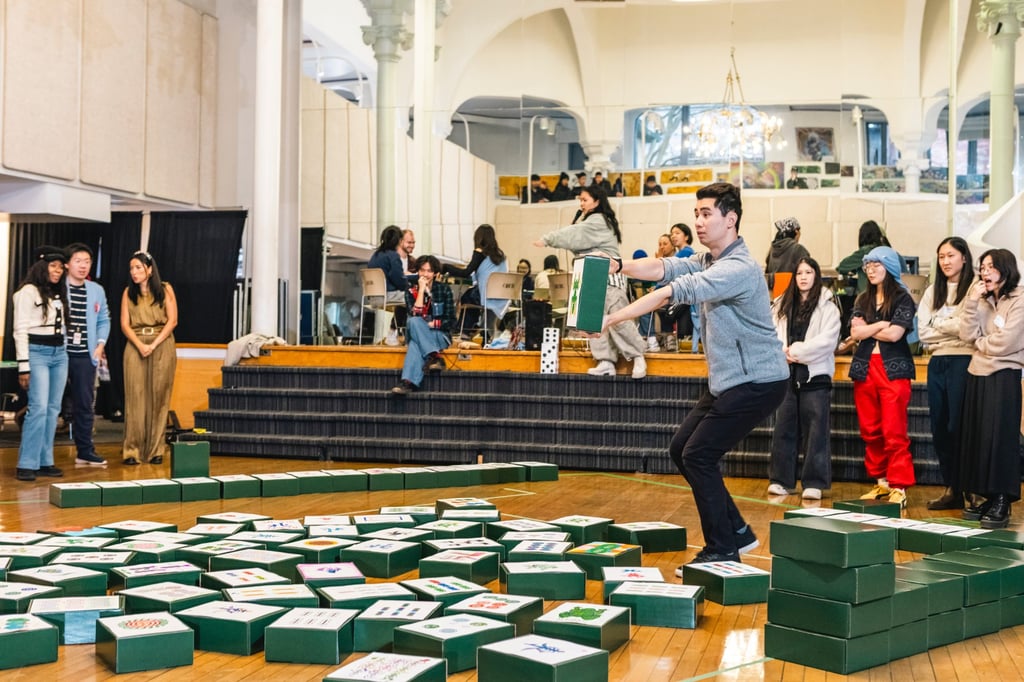 Mahjong fans play a game with outsize tiles in Toronto, Canada. Photo: Gabriel Li