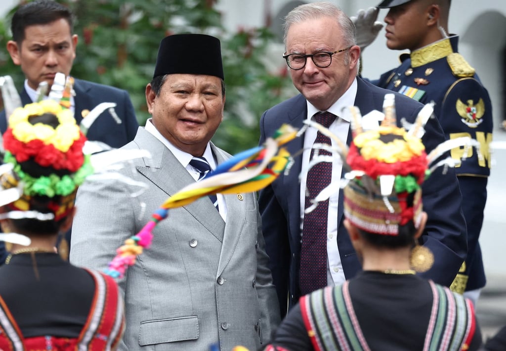 Australian Prime Minister Anthony Albanese (right) watches a traditional dance performance with Indonesian President Prabowo Subianto during a welcome ceremony on Friday. Photo: Reuters