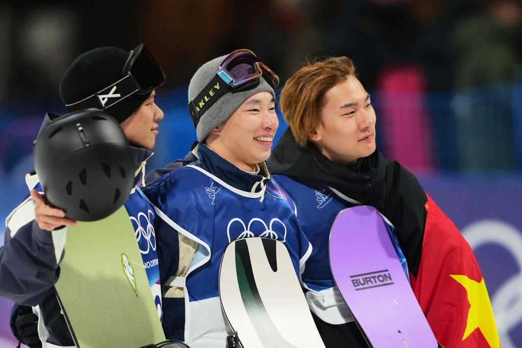 (From left) Silver medalist Japan’s Ryoma Kimata, gold medalist Japan’s Kira Kimura and bronze medalist China’s Su Yiming stand after the men’s snowboarding big air finals in Livigno on Saturday. Photo: AP