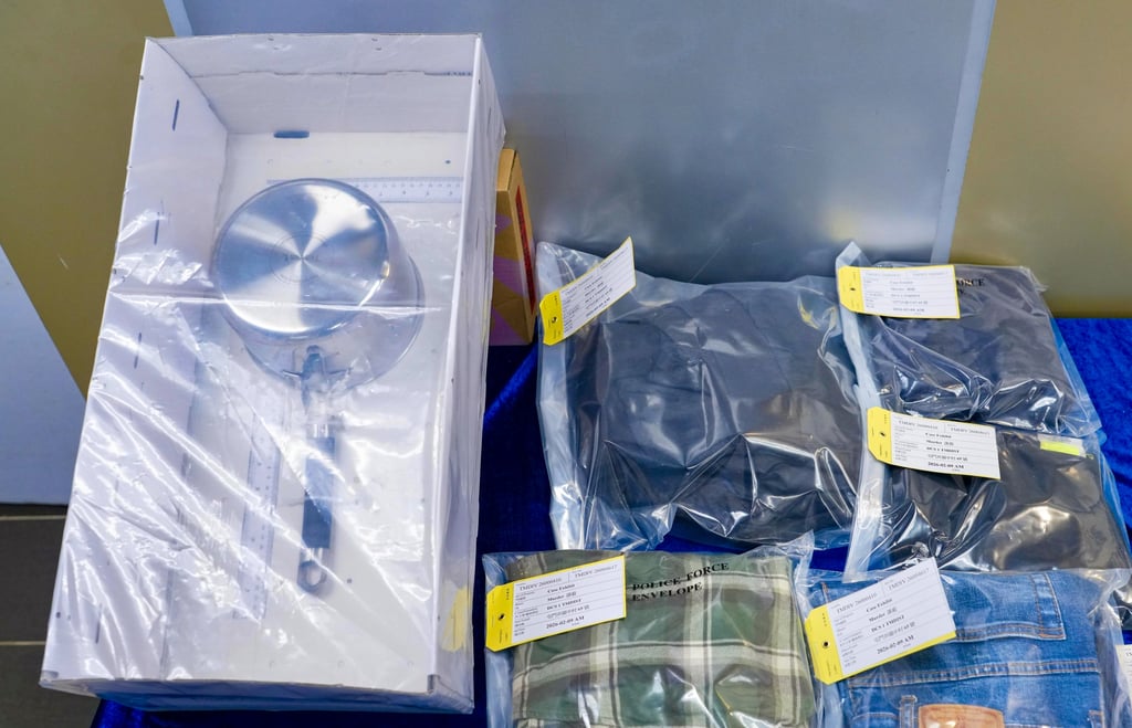 Evidence removed from the scene includes a stainless steel pan. Photo: Handout