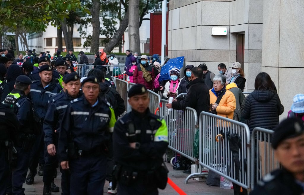 People queue up to enter West Kowloon Court building hoping to secure seats in the public gallery for Jimmy Lai’s trial on February 9. Photo: Sam Tsang