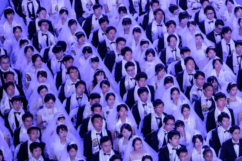 Couples attend a mass wedding ceremony at the Unification Church in Gapyeong, South Korea, on August 27, 2018. Photo: AFP
