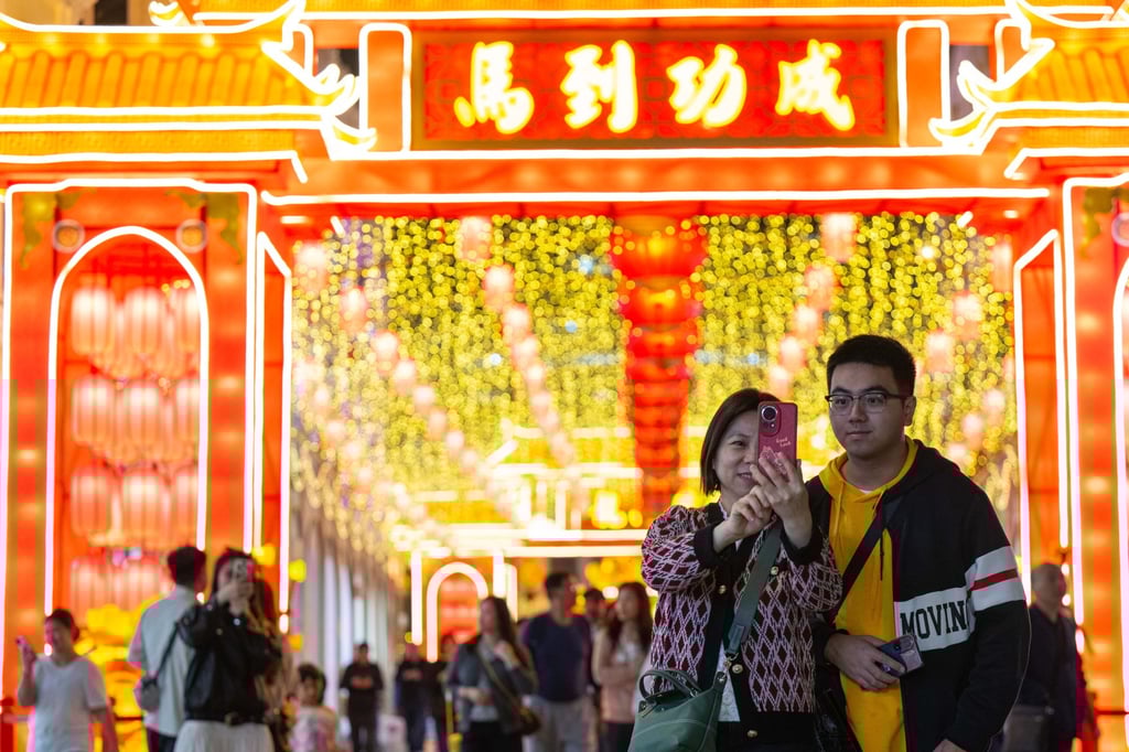 Lucky Chinese sayings like “The horse arrives, success follows,” which means “Success upon the horse’s arrival,” as shown in the photo, are commonly seen at festivities in China, especially during Lunar New Year, to bring good fortune. Photo: Xinhua/Cheong Kam-ka