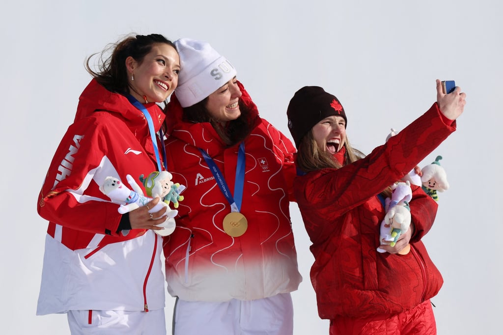 Canada’s Megan Oldham (right) takes a selfie with Mathilde Gremaud (centre) and Eileen Gu. Photo: Reuters Canada’s Megan Oldham (right) takes a selfie with Mathilde Gremaud (centre) and Eileen Gu. Photo: Reuters