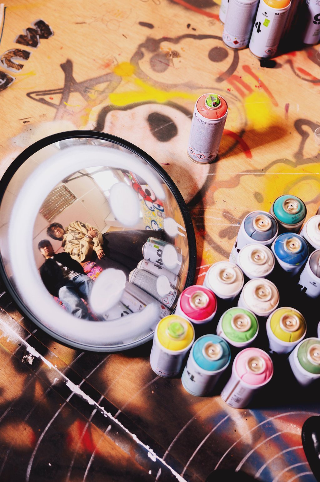 Tools of the trade: Tate and Andrew Mok’s armoury of spray paint. Photo: Jocelyn Tam