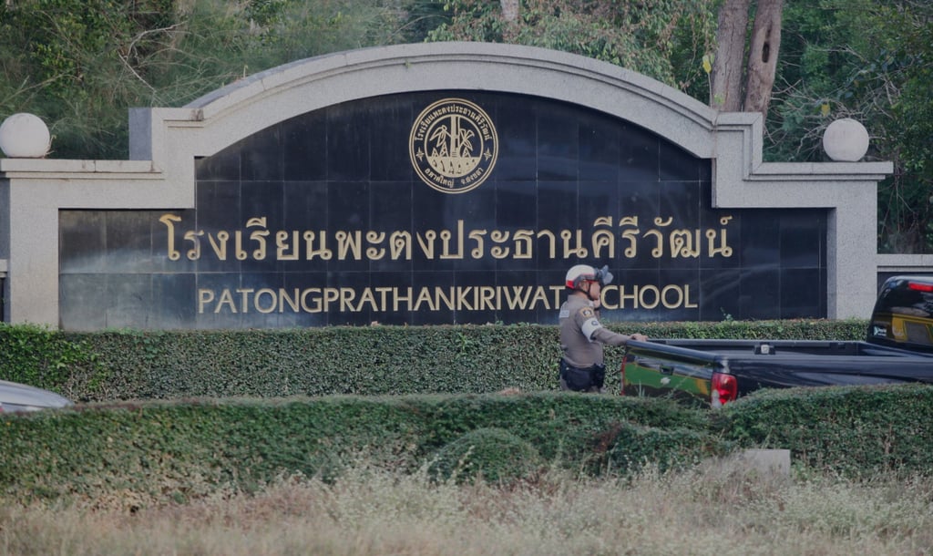 A Thai policeman stands outside Patongrathankiriwt school at Hat Yai, southern Thailand, on Wednesday. Photo: AP