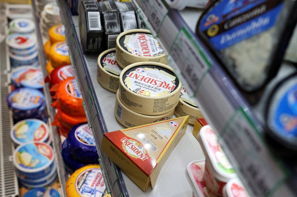 Cheese products are displayed at a supermarket in Beijing last year. China reduces final duties on US$500 million in EU dairy to 11.7 per cent, a major walk-back from 42.7 per cent. Photo: Reuters