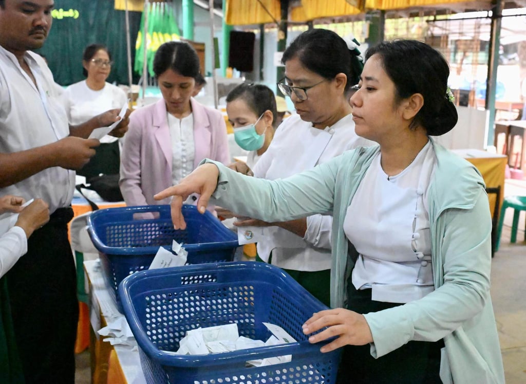 Vote counting takes place on January 25 in Yangon for Myanmar’s general election. Photo: Kyodo