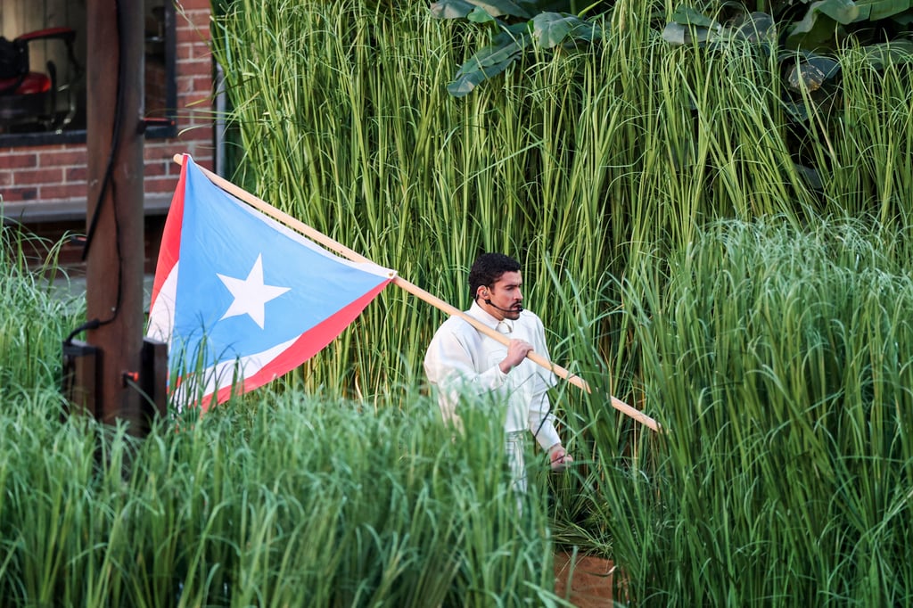 Bad Bunny bearing the Puerto Rican flag at the Super Bowl LX halftime show. Photo: TNS Bad Bunny bearing the Puerto Rican flag at the Super Bowl LX halftime show. Photo: TNS