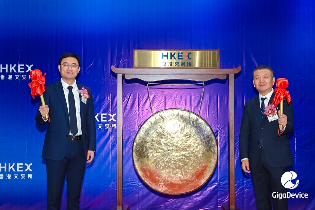 Zhu Yiming (right), chairman of GigaDevice Semiconductor, and Hu Hong, deputy general manager, at the firm’s trading debut on the Hong Kong stock exchange on January 13, 2026. Photo: Handout Zhu Yiming (right), chairman of GigaDevice Semiconductor, and Hu Hong, deputy general manager, at the firm’s trading debut on the Hong Kong stock exchange on January 13, 2026. Photo: Handout