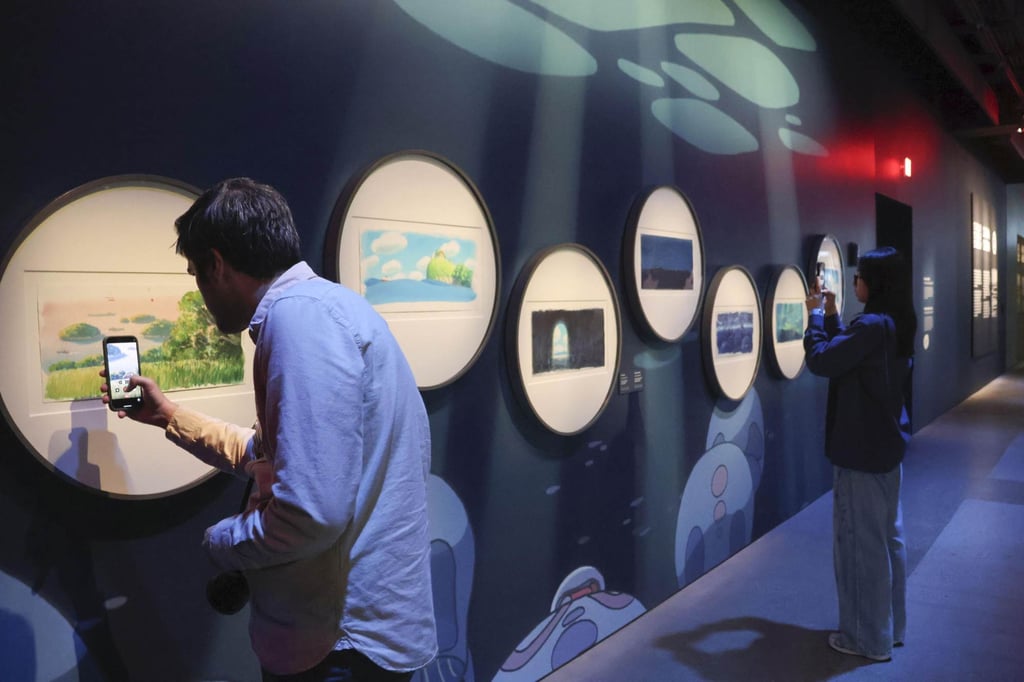 The exhibition features more than 100 original materials and hands-on animation tools. Photo: Kyodo