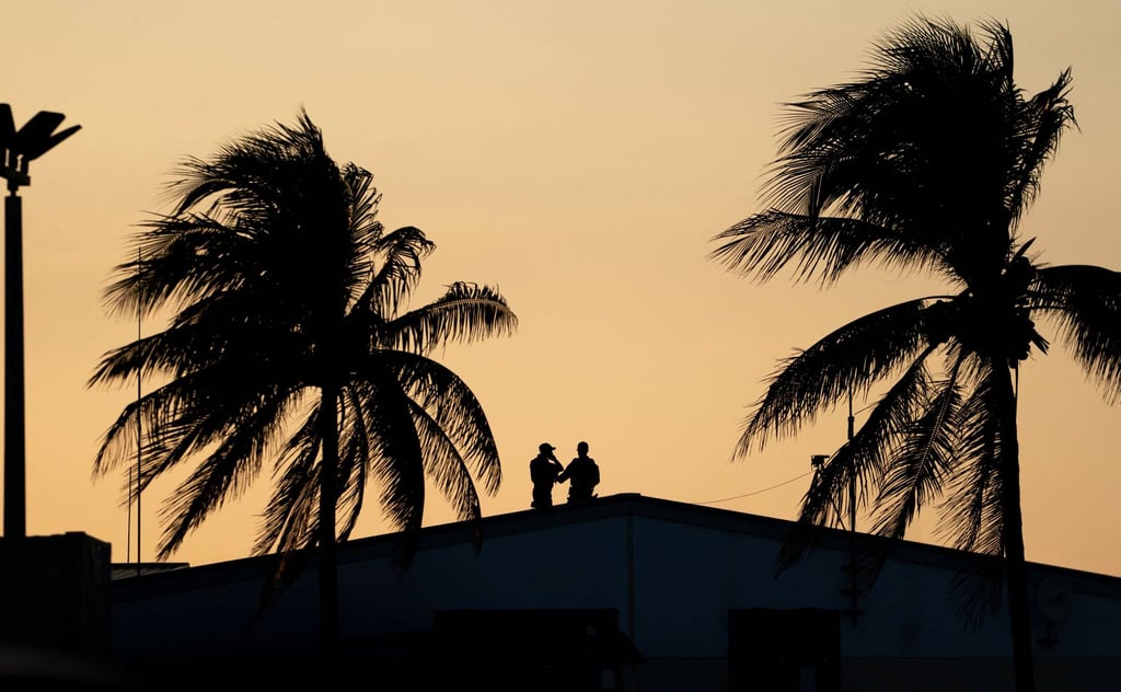 Members of the US Secret Service stand by ahead of President Donald Trump’s arrival at Palm Beach International Airport on February 13. Photo: Getty Images / AFP Members of the US Secret Service stand by ahead of President Donald Trump’s arrival at Palm Beach International Airport on February 13. Photo: Getty Images / AFP