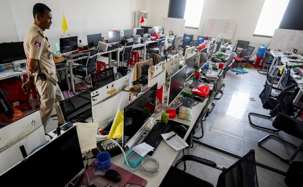A police officer inspects a room used for fraud operations inside a scam compound known as “My Casino” in Kampot province, Cambodia, on February 10. Photo: Reuters