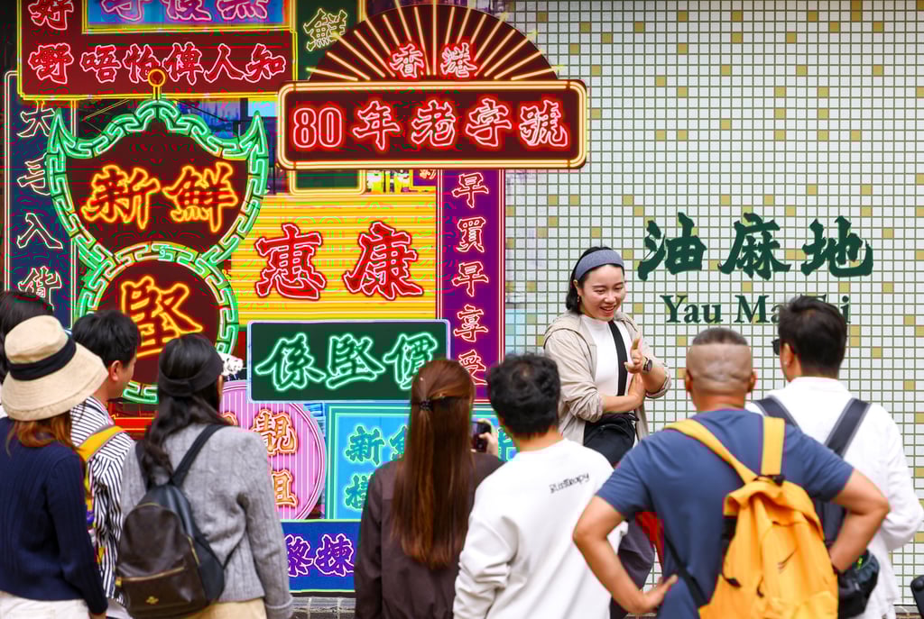 Tourists take photos at the revamped Wellcome supermarket in Yau Ma Tei that pays tribute to Hong Kong’s “golden age”. Photo: Dickson Lee Tourists take photos at the revamped Wellcome supermarket in Yau Ma Tei that pays tribute to Hong Kong’s “golden age”. Photo: Dickson Lee