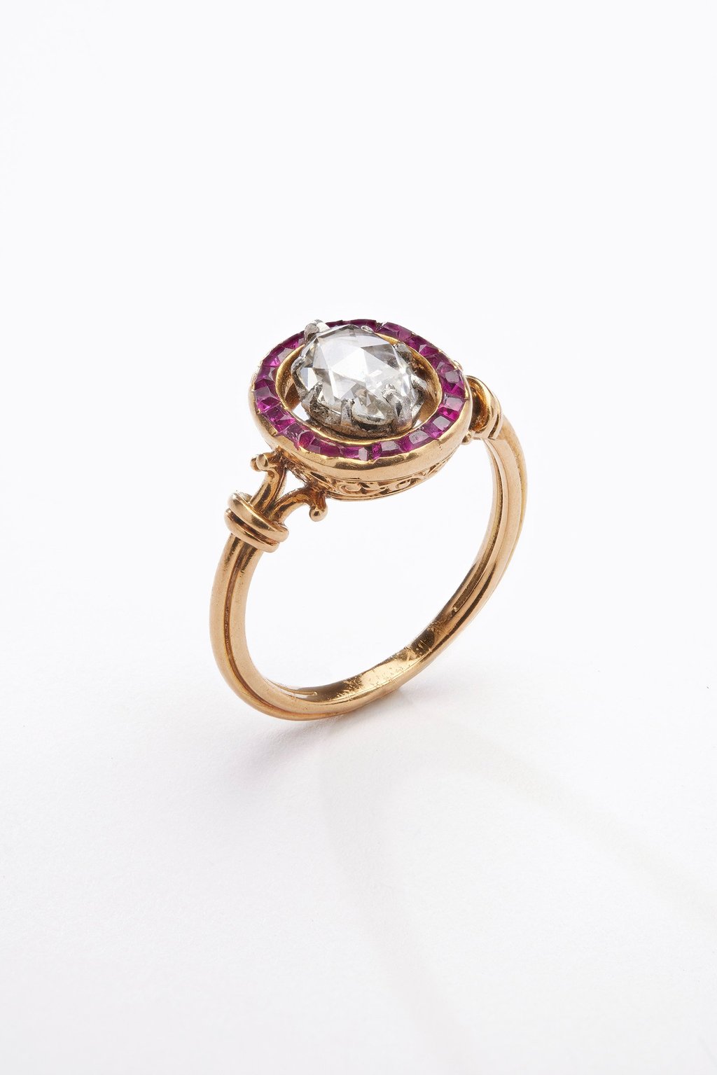 A gold ring with a crowned rose-cut diamond set in platinum prongs, in the centre of a circle of calibrated rubies, circa 1880, France. Photo: Benjamin Chelly/L’ÉCOLE, School of Jewelry Arts