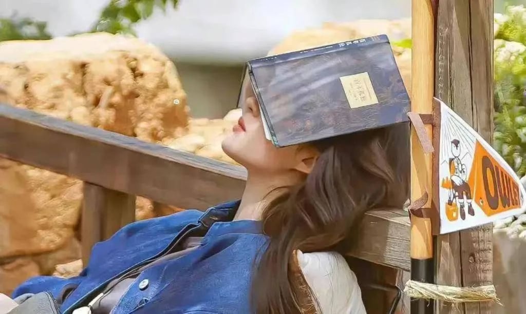 A woman relaxes alone with a good book. Many young people chose not to make the troublesome journey back home for the Chinese New Year. Photo: lifeweek