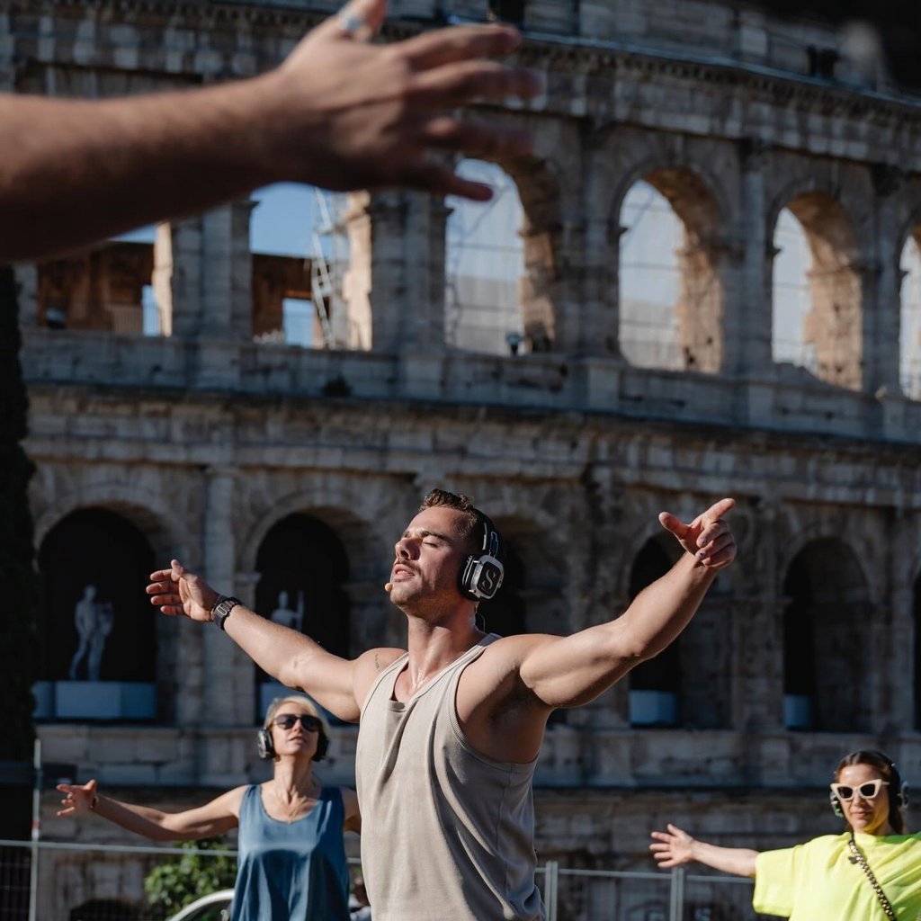 Sanctum founder Luuk Melisse leads a mindful movement session outdoors as part of a retreat at Six Senses in Rome. Photo: Instagram/luukmelisse