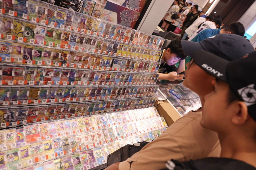 Collectors look at Pokemon trading cards at an event at Hong Kong’s Hopewell Centre on June 21, 2025. Photo: Nora Tam Collectors look at Pokemon trading cards at an event at Hong Kong’s Hopewell Centre on June 21, 2025. Photo: Nora Tam