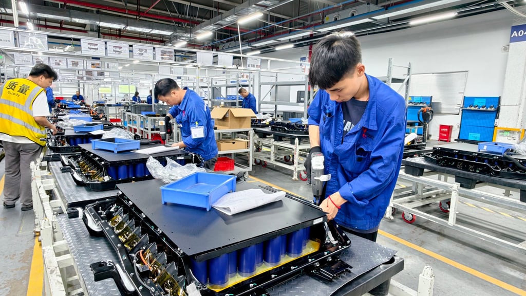 Workers produce new energy vehicle batteries at Huating New Energy Technology in Liuzhou, Guangxi. Photo: Costfoto/NurPhoto via Getty Images Workers produce new energy vehicle batteries at Huating New Energy Technology in Liuzhou, Guangxi. Photo: Costfoto/NurPhoto via Getty Images