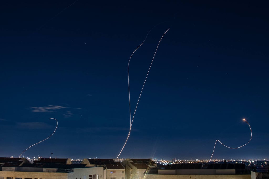 An Israeli air defence system intercepts a ballistic missile barrage over Tel Aviv launched from Iran on Sunday. Photo: Sopa Images/Zuma Press Wire/dpa