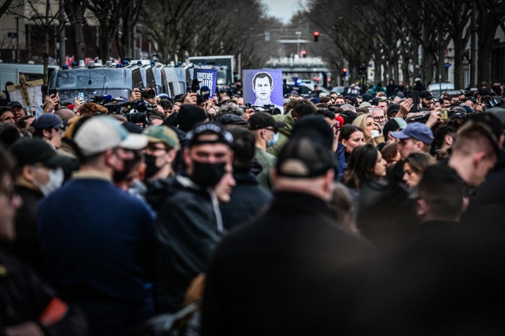 Protesters hold a portrait of far-right activist Quentin Deranque during a march in Lyon, France, on February 21. Photo: AFP Protesters hold a portrait of far-right activist Quentin Deranque during a march in Lyon, France, on February 21. Photo: AFP