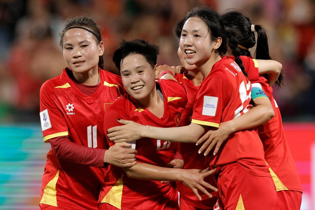 Vietnam’s Ngan Thị Vạn (centre) scored her team’s goals in their 2-1 win over India. Photo: AP