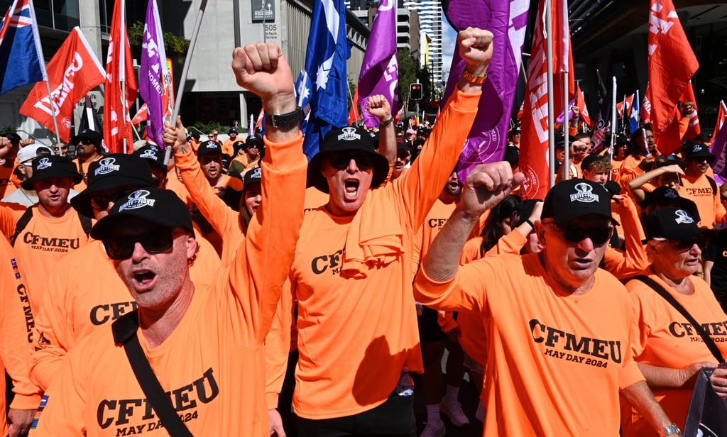 Members of the Construction, Forestry and Maritime Employees Union march to mark Labour Day in Brisbane on May 6, 2024. Industries such as mining and construction tend to have the largest gender pay gaps. Photo: EPA-EFE Members of the Construction, Forestry and Maritime Employees Union march to mark Labour Day in Brisbane on May 6, 2024. Industries such as mining and construction tend to have the largest gender pay gaps. Photo: EPA-EFE
