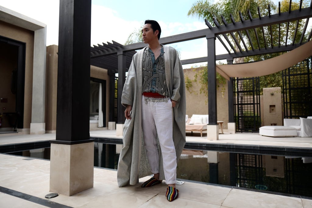 Calvin Wang in traditional bisht and Dries van Noten shirt. Photo: Handout