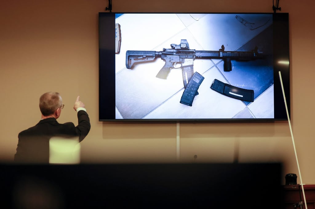 District Attorney Brad Smith points to a weapon displayed on a screen during Colin Gray’s trial in Winder, Georgia, on Monday. Photo: Atlanta Journal-Constitution via AP District Attorney Brad Smith points to a weapon displayed on a screen during Colin Gray’s trial in Winder, Georgia, on Monday. Photo: Atlanta Journal-Constitution via AP