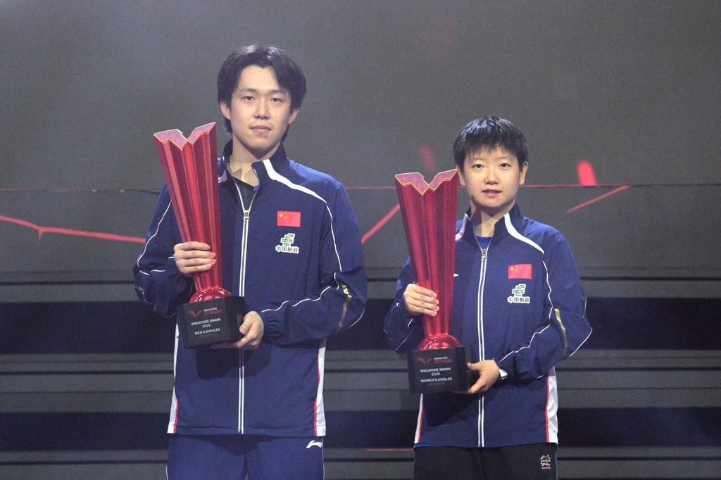 Wang Chuqin (left) and Sun Yingsha won their respective singles titles at Singapore Smash. Photo: Xinhua