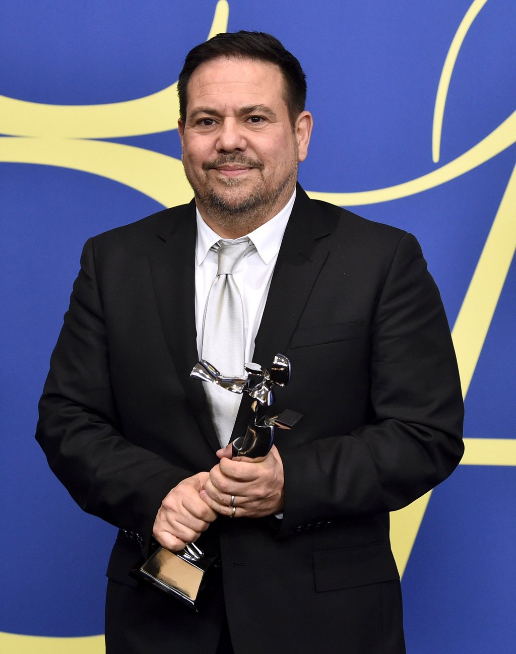 Narciso Rodriguez, winner of the lifetime achievement award, poses in the winner’s walk at the CFDA Fashion Awards at the Brooklyn Museum in June 2018, in New York. Photo: AP