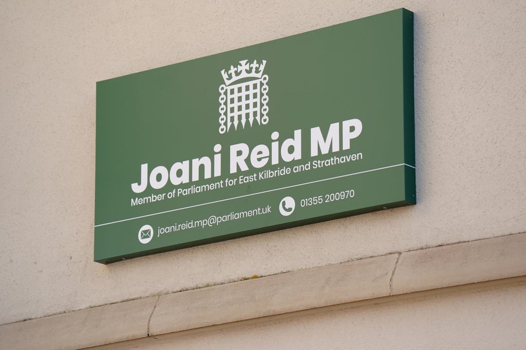 Signage is seen at the constituency office of Joani Reid in East Kilbride, Scotland, on Wednesday. Photo: PA via AP Signage is seen at the constituency office of Joani Reid in East Kilbride, Scotland, on Wednesday. Photo: PA via AP
