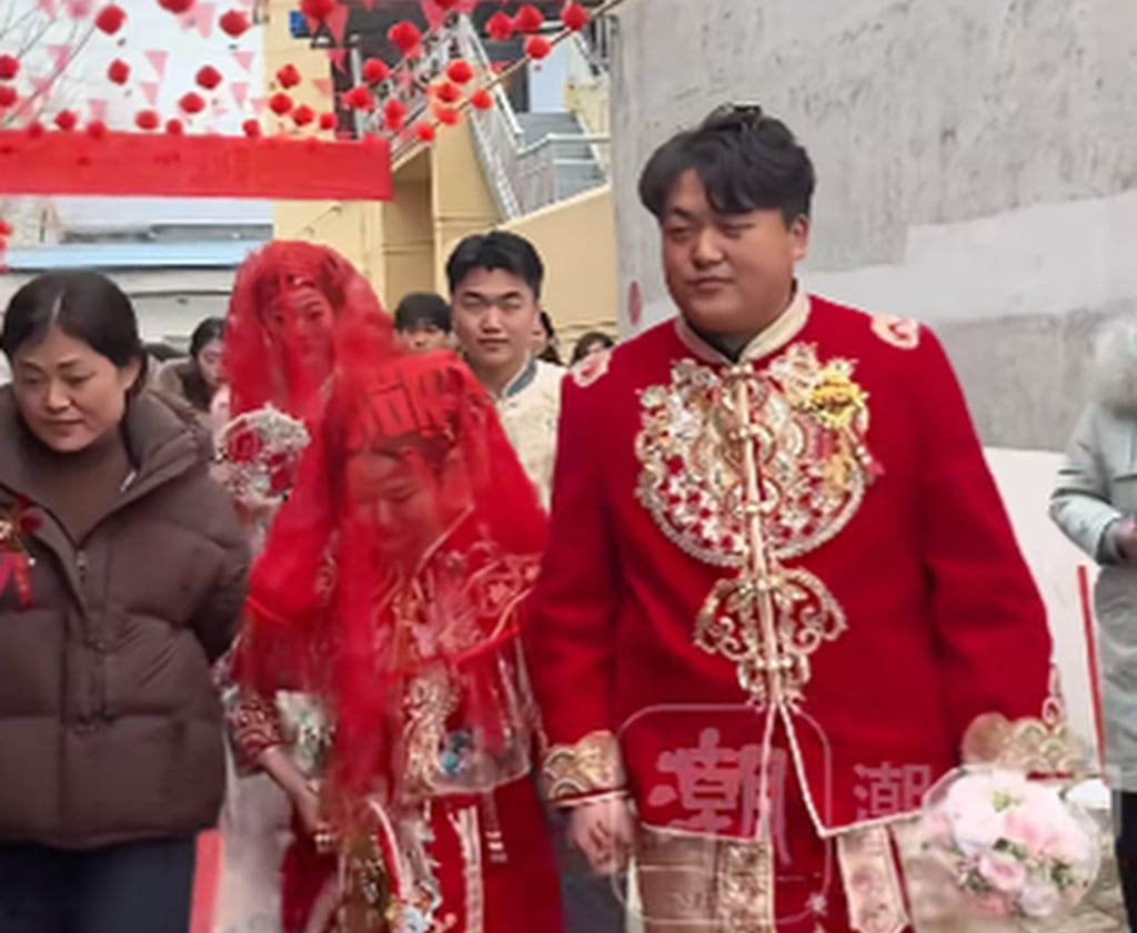 The couples walking together during the event were predominantly dressed in red. Photo: Douyin The couples walking together during the event were predominantly dressed in red. Photo: Douyin