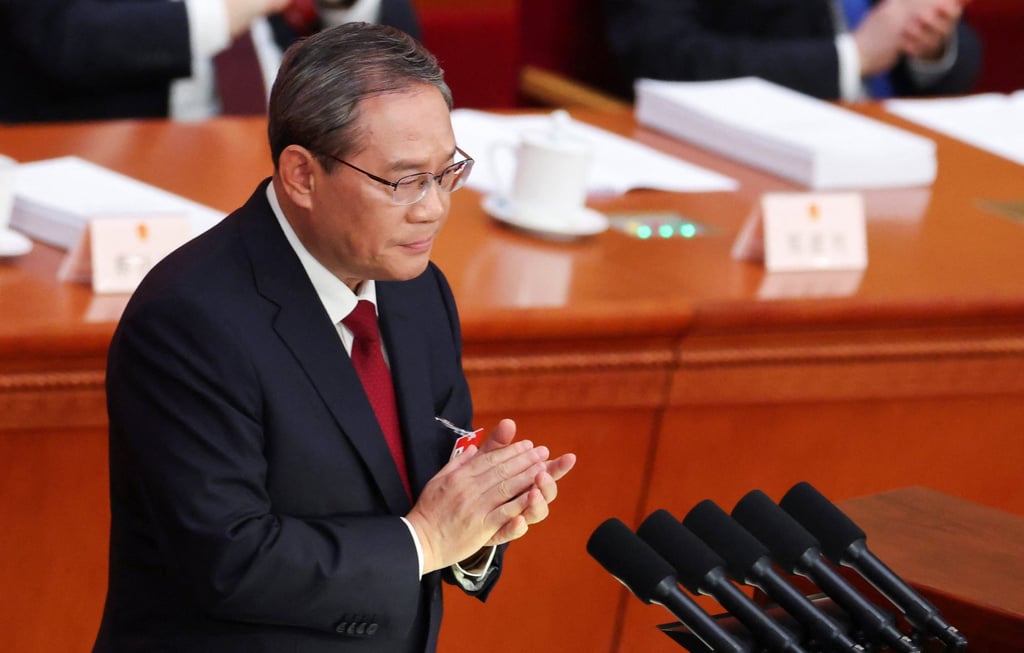 Chinese Premier Li Qiang delivers the government work report during the opening session of the National People’s Congress in Beijing on Thursday. Photo: Reuters