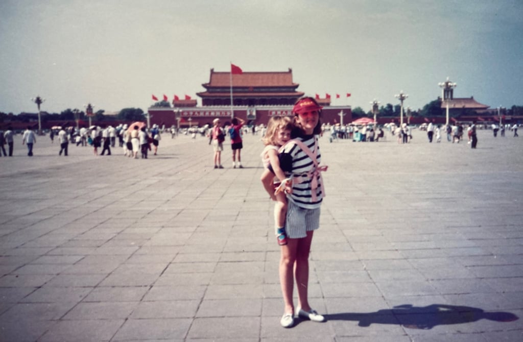 Houng with daughter Becky in Tiananmen Square, Beijing, in 1992. Photo: courtesy Jane Houng